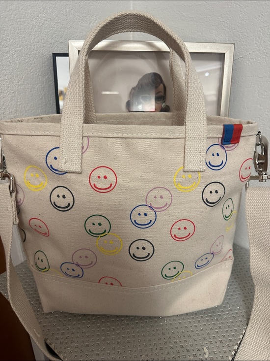 KULE Handbags - KULE smiley face all over print canvas bucket bag